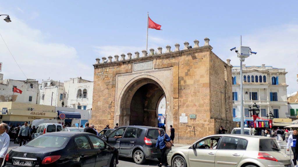Former city gate Porte de France or Bab el Bhar between Medina and the new town